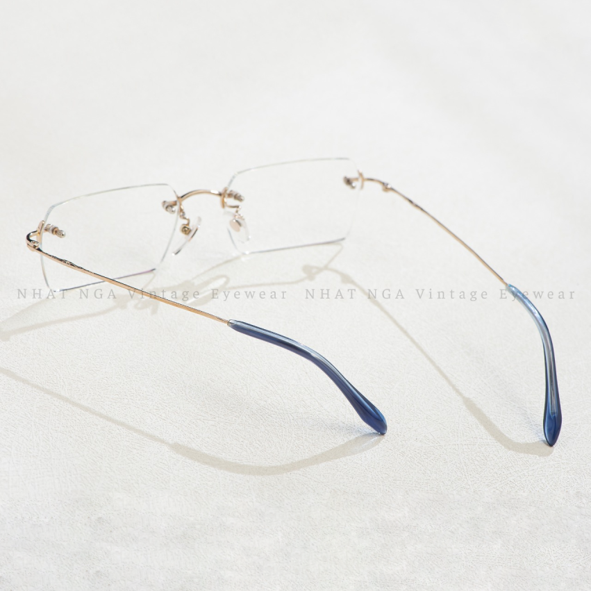 GỌNG KÍNH 3 MẢNH VÀNG TRẮNG NỘI ĐỊA NHẬT P-2014