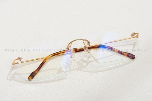 GỌNG KÍNH VÀNG PENTAX 0908