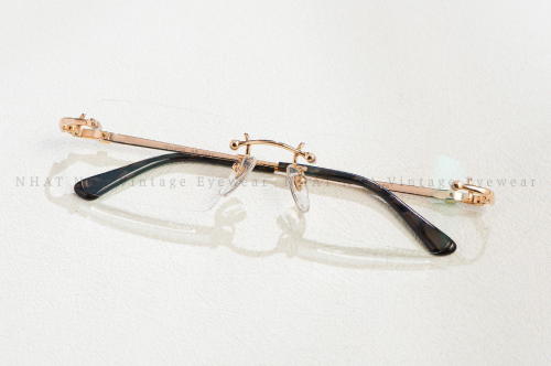 GỌNG KÍNH 3 MẢNH VÀNG HỒNG NINA RICCI NR2650